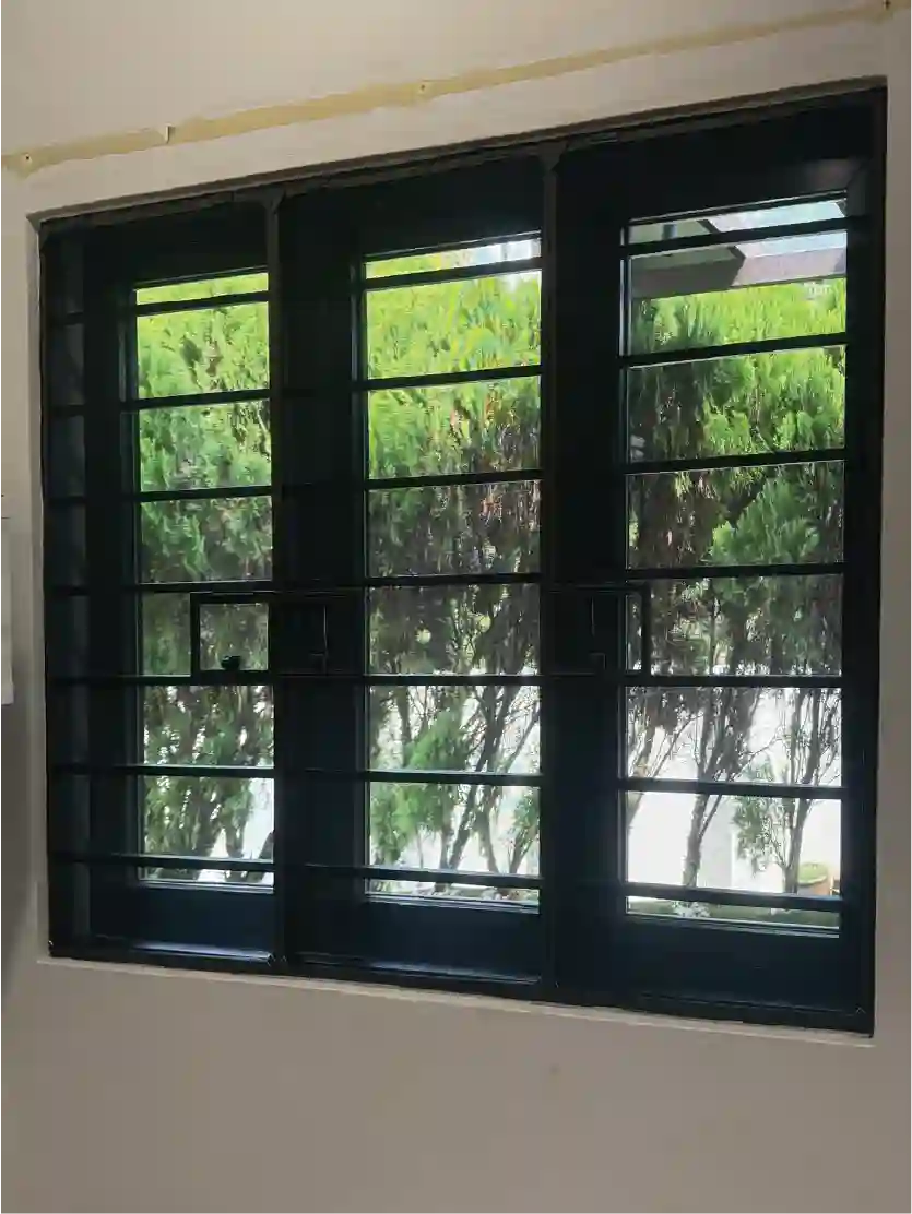 Ckool installer fitting window film on site